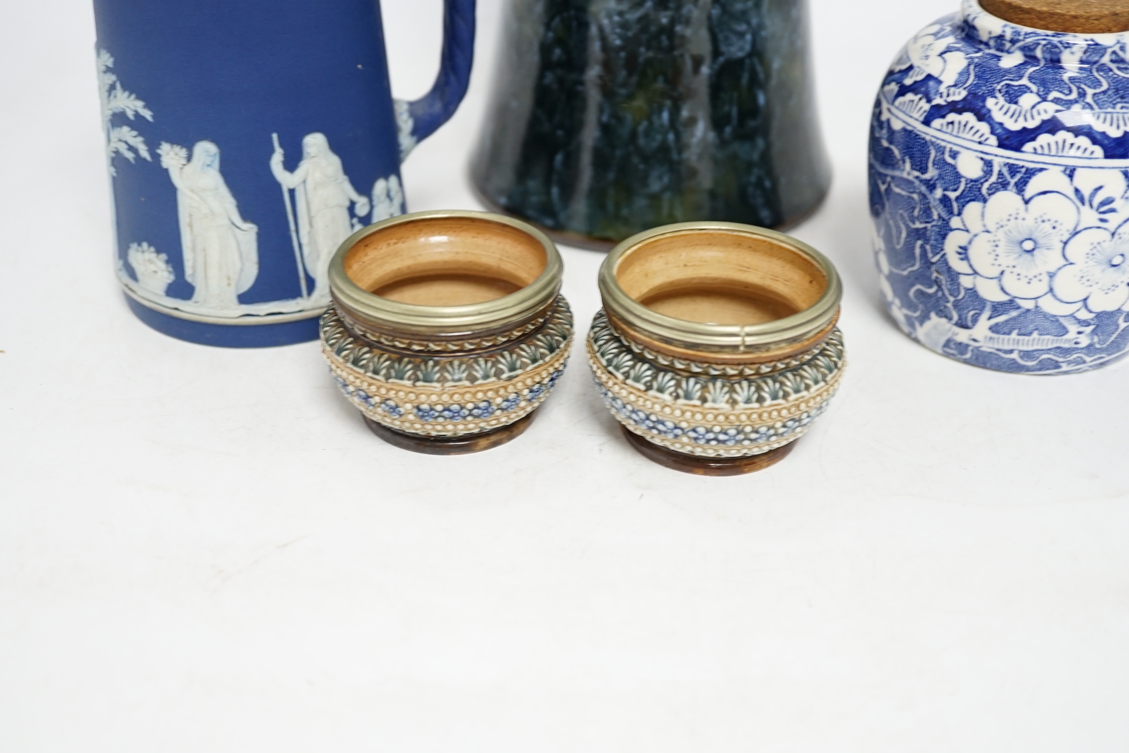 Five ceramic items comprising Doulton vase, two miniature Doulton pots, a Wedgwood jug and a blue and white jar, largest 33cm. Condition - two pots poor, others good
